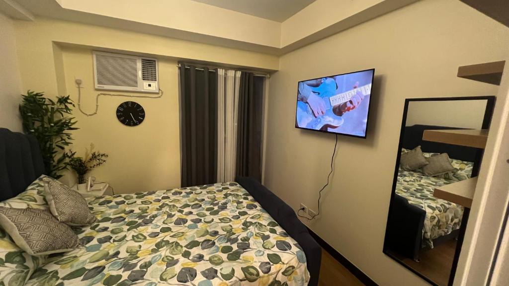 A. Bonifacio Apartment | 1-BR Condo Unit at The Celandine with Refreshing Balcony-view of the Pool