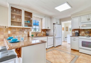 Delightful Canal-Front Home with Private Pool, Gas Grill, WiFi, & Water Views