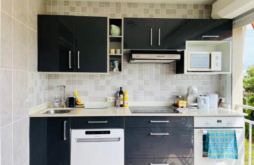 Pointe de la verdure Apartment | Appartement vue mer, piscine, dans quartier prisé de Gosier