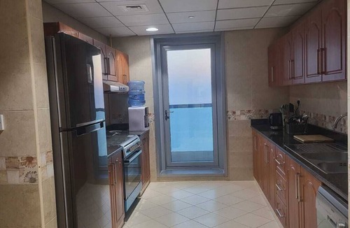 Rumailah Apartment | Duplex Spacious 4-bedroom sunset sea views apartment with swimming pool.