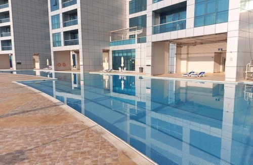 Rumailah Apartment | Duplex Spacious 4-bedroom sunset sea views apartment with swimming pool.