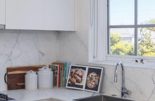 St. Kilda East Apartment | Golden Alma A Radiant Escape between City and Sand