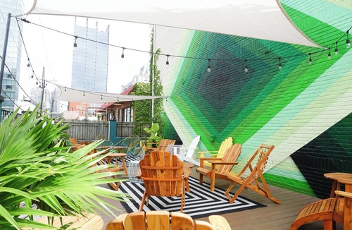 Rutledge Hill House | Sleeps 24 | 12 SoBro Suites Near Broadway, Dining & Music – by AvantStay