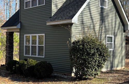 Clarksville Cottage | Solar powered cottage at lake, with dock, on private 300 acre timber preserve