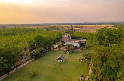 Hoshiarpur Villa | StayVista at Peacocks & Partridges with Amidst Greenery, Terrace, Indoor Fireplace, Bar & Snooker Table
