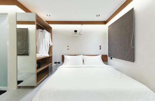 Makati Apartment | The Kin House - Stay in Art Poblacion