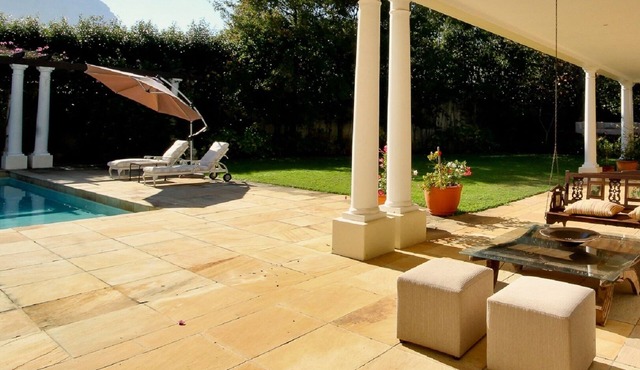 The Constantia nestles among vineyards with spectacular mountain views.