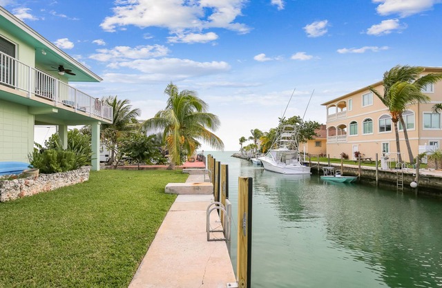 Amazing Waterfront Gem W/ Boat Dock, Wraparound Balcony & Full Kitchen