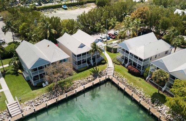 Harbor Village Home with Boat Dockage: Canalside 3BR/2.5BA Cottage 7061