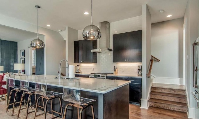 Edgehill House | Amplify at the Gulch modern 3 story condo 2 car garage rooftop fire pit security and view