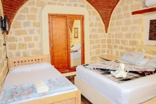 Tunis Village Hostel | Tebtunis Hotel