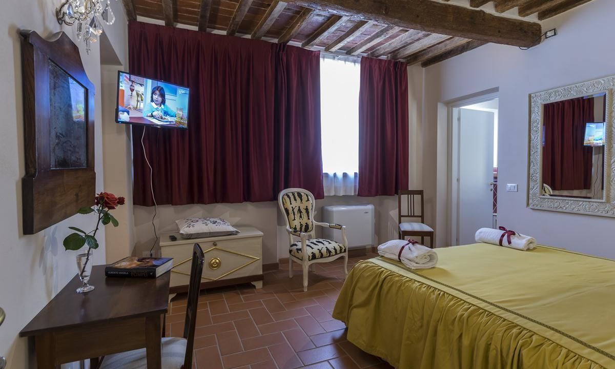 Photo of Bedroom in Lucca Historical Center