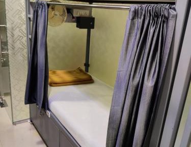 Single Bed in Male Dormitory Room with Shared Bathroom