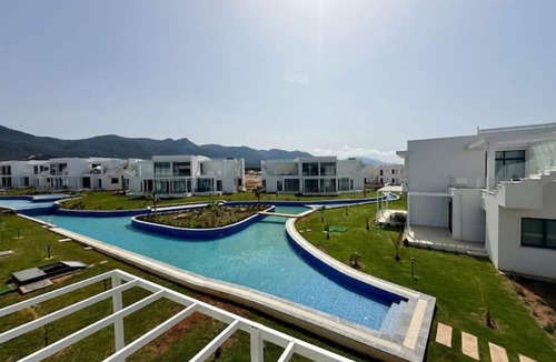 Bahceli Apartment | Chic penthouse in green resort: pool + gym